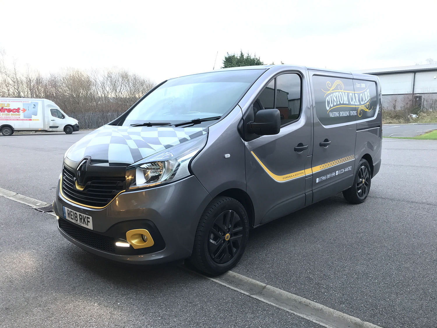 An image of Custom Car Care vehicle graphics.